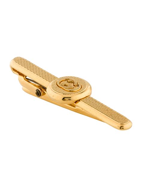 gold gucci tie pin|Gucci ribbon brooch for sale.